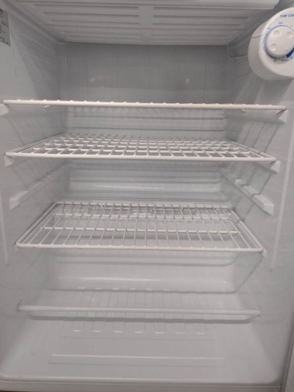 GE Spacemaker GMR04AAMWW 4.4 Cubic Foot Compact Refrigerator (no ice cube tray)