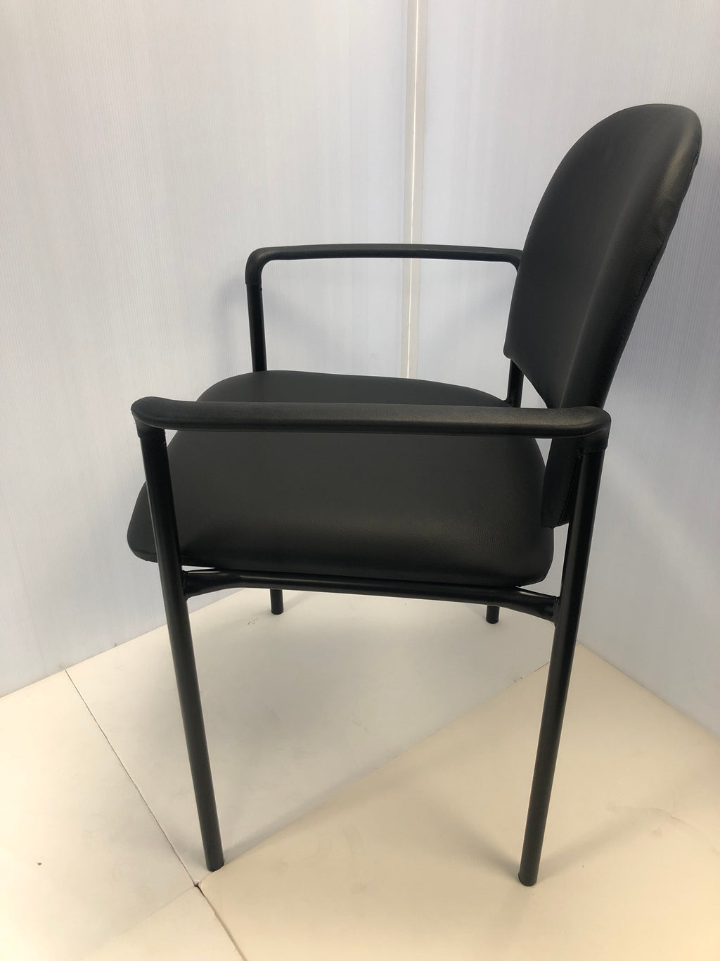 Stackable Steel Side Reception Chair with Arms in Black Vinyl